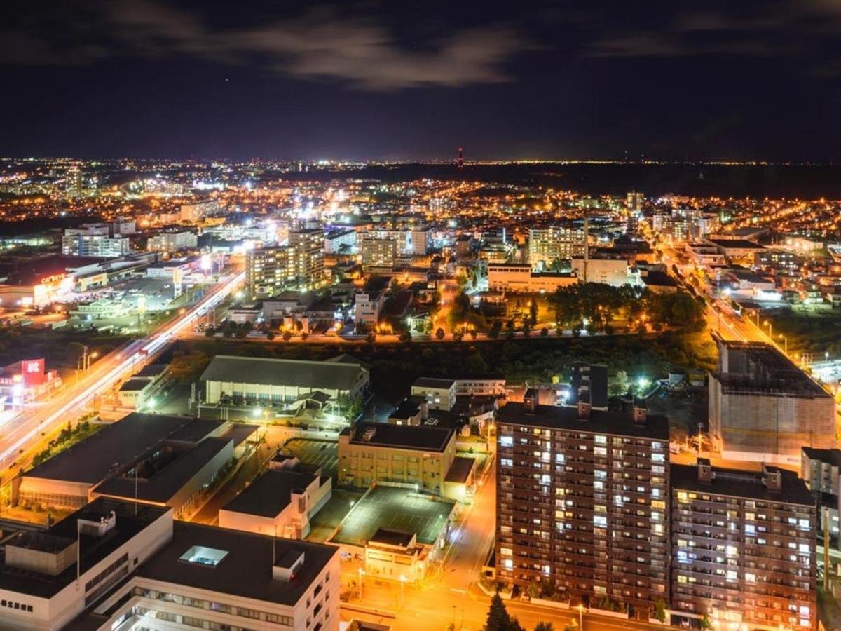 Hotel Emisia Sapporo Ngoại thất bức ảnh Aerial view of the city at night